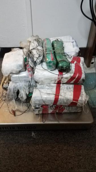 Packages containing 27.50 pounds of cocaine seized by CBP officers at Eagle Pass Port of Entry