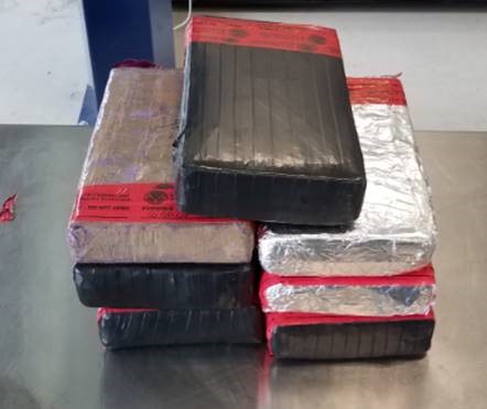 Packages containing a total of 38 pounds of heroin ad cocaine seized by CBP officers at Juarez-Lincoln International Bridge