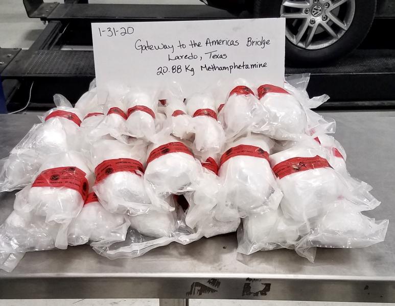 Packages containing 46 pounds of methamphetamine seized by a CBP officer at Laredo Port of Entry