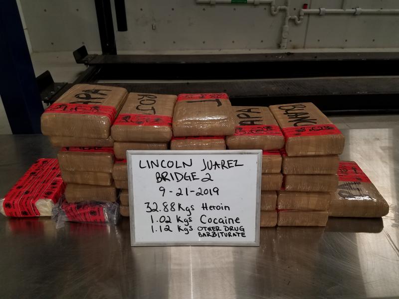 Packages containing 72.5 pounds of heroin, 2.24 pounds of cocaine, 2.46 pounds of norephedrine hydrochloride seized by CBP officers at Juarez-Lincoln Bridge