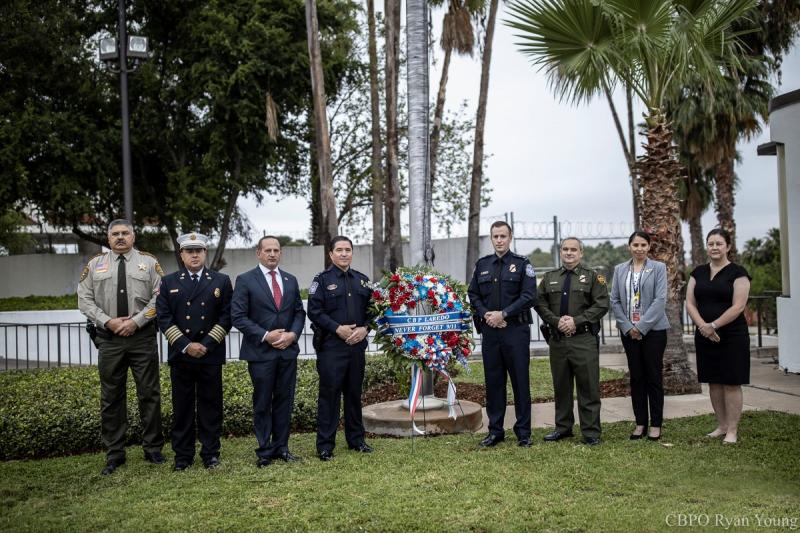 CBP, together with federal, state and local law enforcement partners pose in a group photo during the 19th annual 9/11 remembrance ceremony held at Juarez-Limcoln Bridge