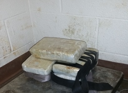Packages containing 14.64 pounds of cocaine seized by CBP officers at Brownsville Port of Entry