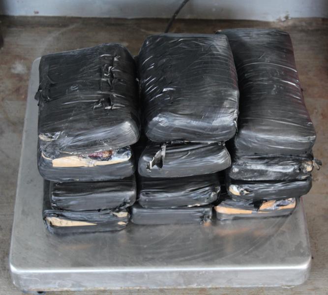 Packages containing 28 pounds of heroin seized by CBP officers at Pharr International Bridge