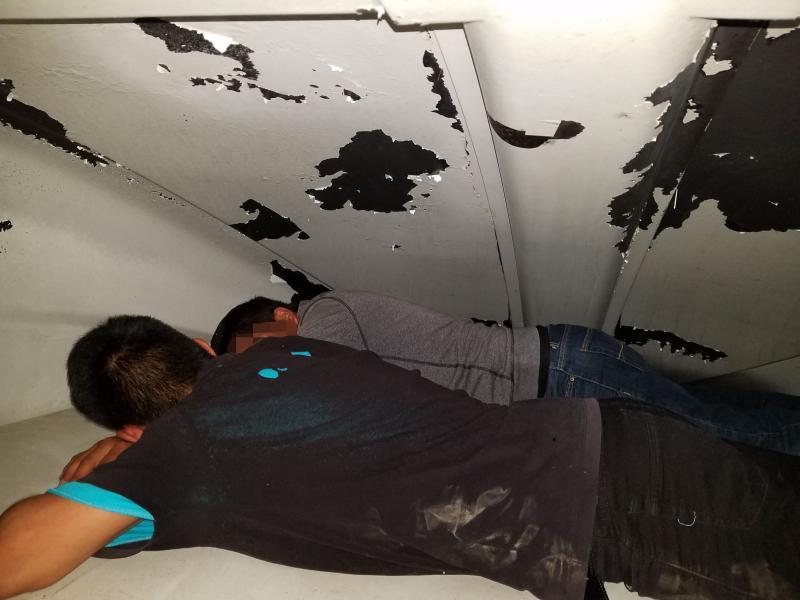 Border Patrol agents discovered two illegal aliens in the windjammer of a semi-tractor at the Interstate 35 checkpoint