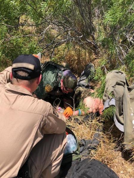 A Border Patrol emergency medical technician administered intravenous fluids to an alien in distress suffering from dehydration.
