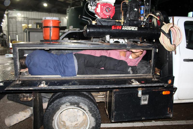 Laredo Sector Border Patrol agents discover the two aliens hidden in a truck toolbox