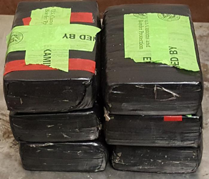 Packages containing 11.55 pounds of heroin seized by CBP officers at Brownsville Port of Entry