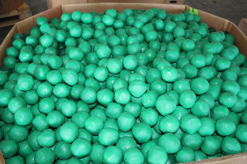 Lime-shaped bundles containing 3,947 pounds of marijuana seized by CBP officers at Pharr Bridge