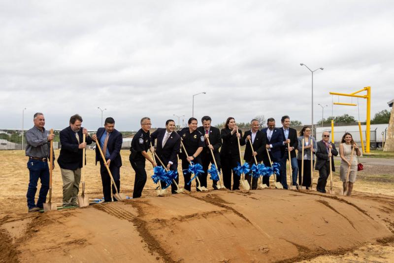 Public, elected and agency leadership officials from U.S. Customs and Border Protection, City of Laredo, General Services Administration, Texas Department of Transportation and U.S. House of Representatives among others, turn shovels of dirt at World Trade Bridge to commemorate the groundbreaking for the Donations Acceptance Program project to relocate four FAST lanes outside the import lot facility.
