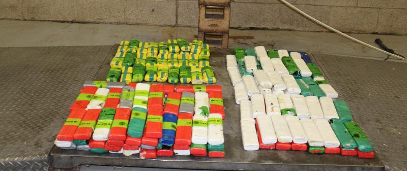 Packages containing 85.63 pounds of methamphetamine and 16.22 pounds of heroin seized by CBP officers at Pharr International Bridge.