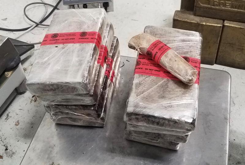Packages containing nearly 20 pounds of cocaine and 5.46 pounds of heroin, one of four interceptions of narcotics realizedby CBP officers at Laredo Port of Entry this weekend.