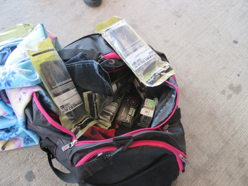 Ammo and magazines in duffle bag.