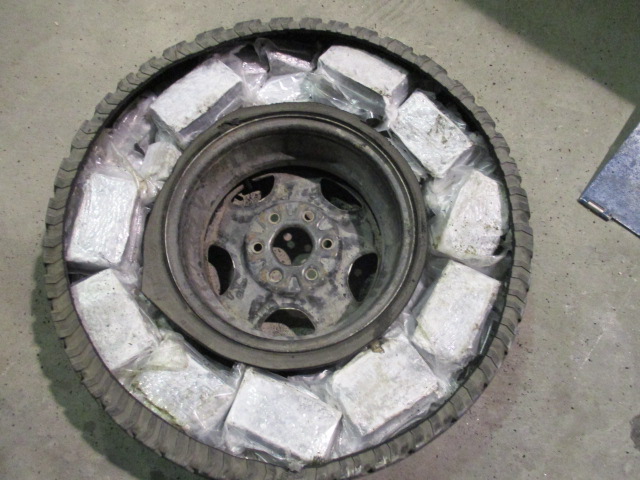 Drug bundles in spare tire.