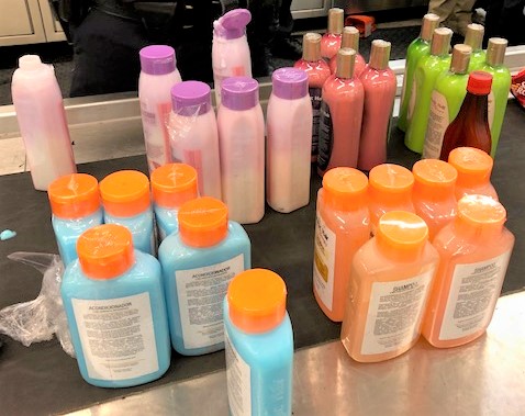 24 shampoo bottles