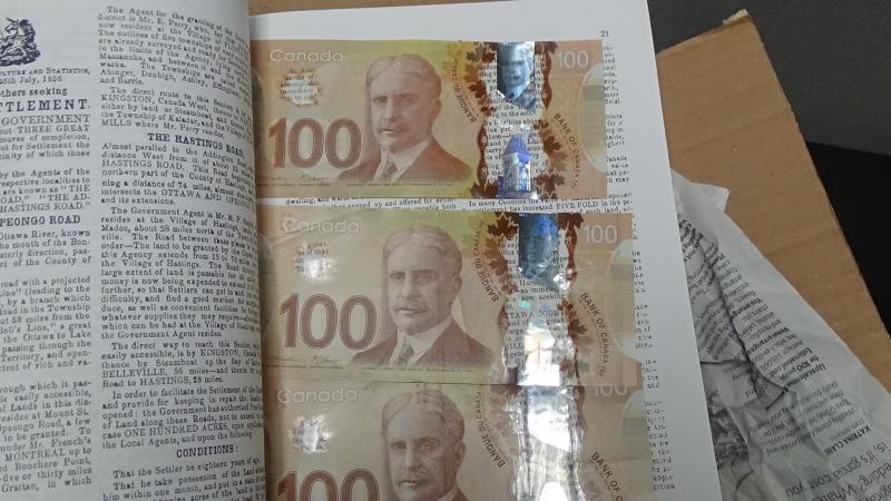 $4000 Canadian dollars found hidden in book