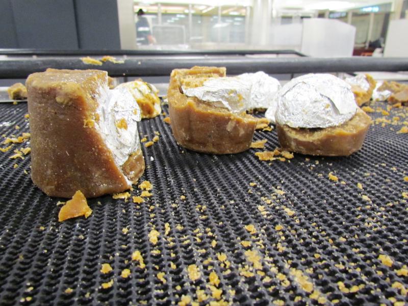 Cocaine hidden in caramelized sugar cane sweets at Dulles International Airport.