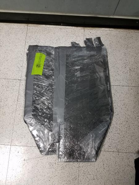 CBP at JFK Find Cocaine in Suitcase