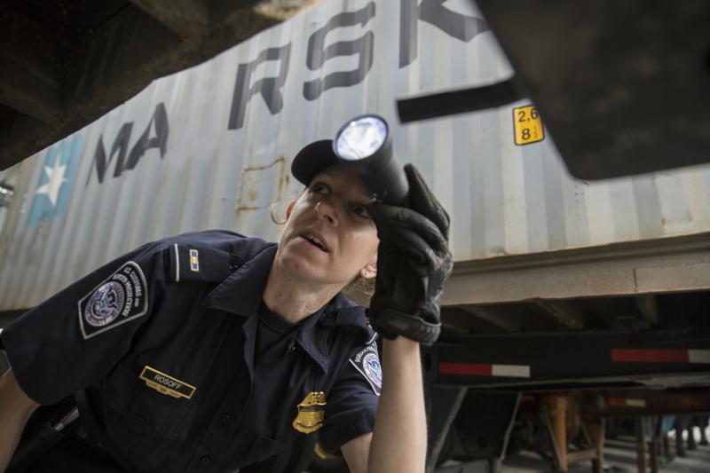CBP agriculture specialist inspecting shipping containers recently in Baltimore.