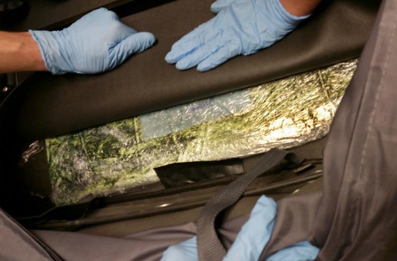 Boston CBP officers arrested 2 PA men after discovering more than 13 pounds of cocaine concealed in their baggage at Logan International Airport on July 2, 2016.