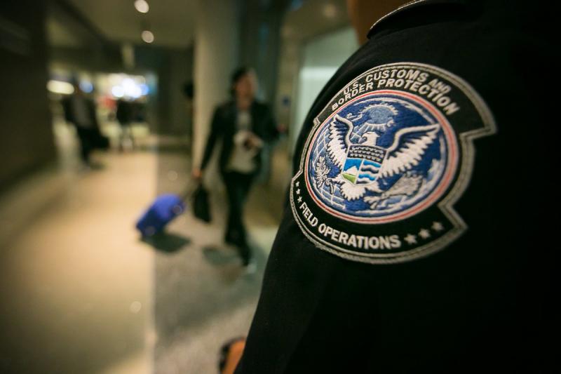 Customs and Border Protection officers standing watch at a U.S. Port of Entry.