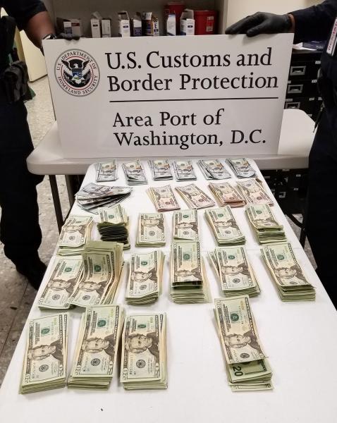 CBP officers seized nearly $66,000 in unreported currency from two separate travelers at Washington Dulles International Airport this weekend.