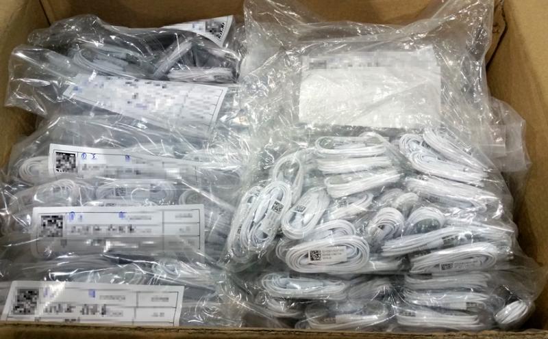 A box of counterfeit earbuds CBP officers seized.