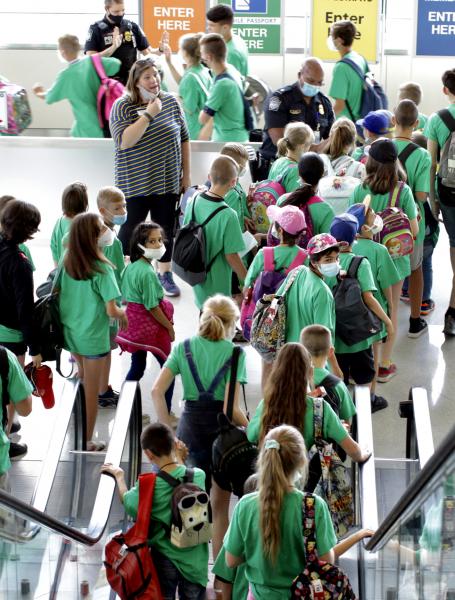 U.S. Customs and Border Protection welcomed 65 Ukraine orphans at Washington Dulles International Airport on June 26, 2021. The orphans are visiting the U.S. as part of the Open Hearts and Homes for Children Orphan Hosting Program.