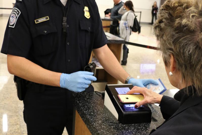 Traveler processes her international arrival on CBP's Mobile Passport Control app..