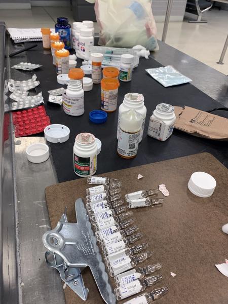U.S. Customs and Border Protection officers discovered a cache of prescription medications in the baggage of a traveler who arrived from Cancun, Mexico on April 11, 2021.