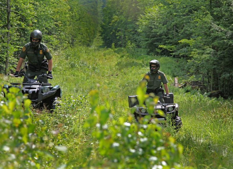 Agents from the Richford, Vt., Border Patrol Station patrol the northern border on all-terrain vehicles.