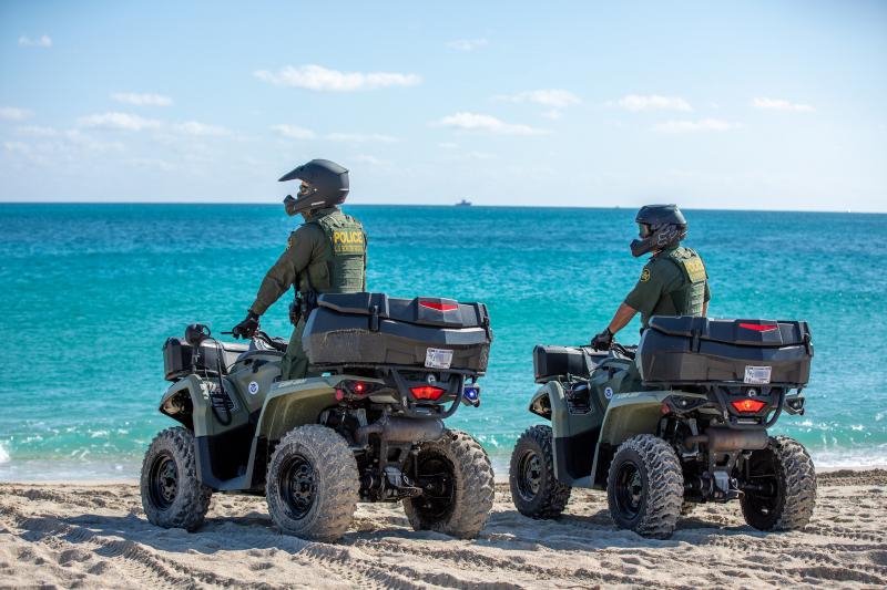 Border Patrol ATV's patrol a beach in western Puerto Rico