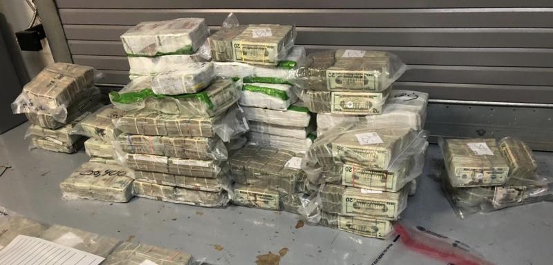 Packs of currency after they were found inside a duffle bag.  