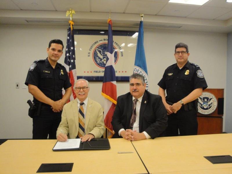 During the signing of the MOA (seated from left to right): Celso E. Lopez, President of Copeca Jet Center, and Marcelino Borges, CBP Director of Field Operations in Puerto Rico and the USVI.  (Standing) Carlos Gomez, Assistant Area Port Director, and Edwin Cruz, Area Port Director.  