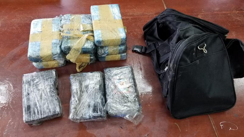 10 bricks of cocaine were found inside a black bag.  