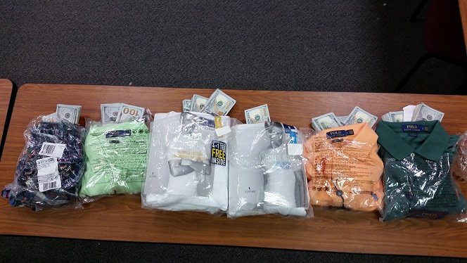 A traveler tried to conceal $107,000 in sealed shirt bags.