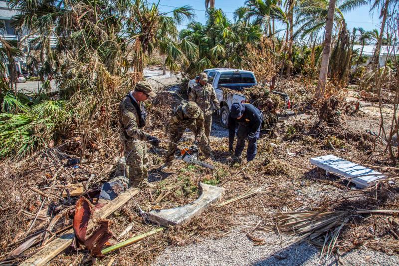 Border Patrol agents and CBP officers help clear debris after Hurricane Irma