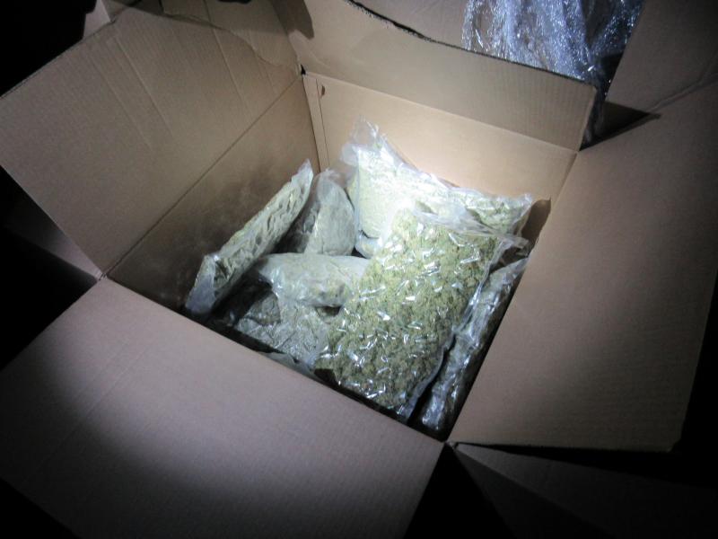 Vacuum-sealed bags that contained marijuana secreted within the boxes.