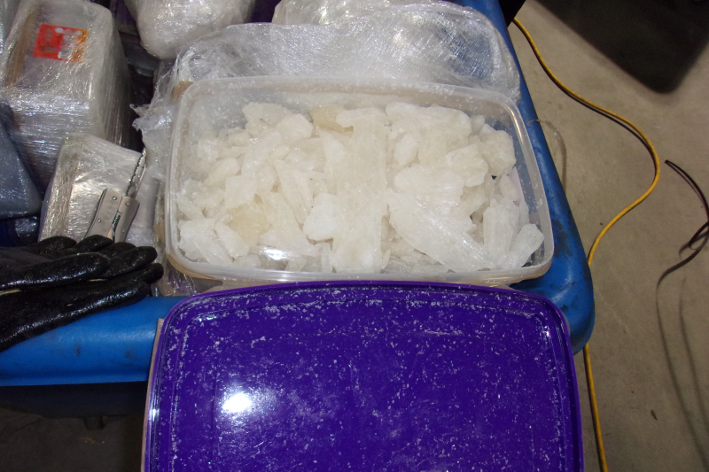 Customs officials seize 140 pounds of meth hidden in paint containers 