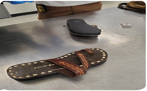 CBP officers discovered cocaine within a pair of sandals.