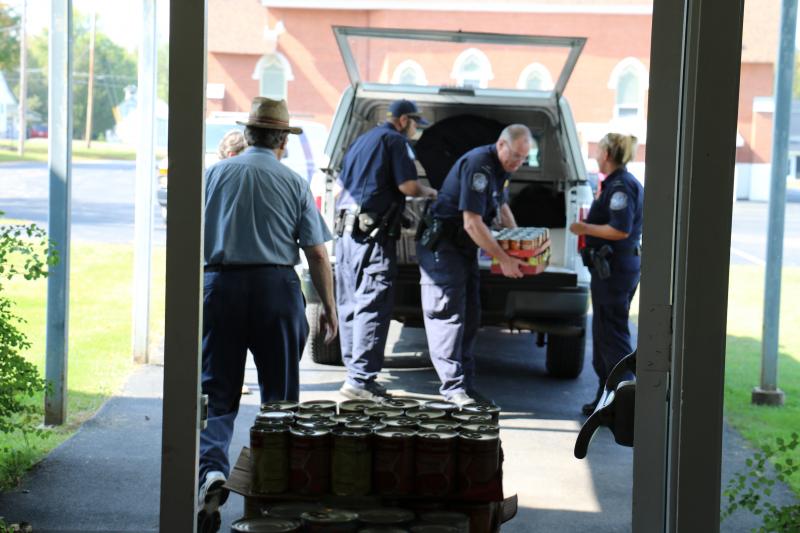 CBP employees help stock food pantry in Brasher Falls, N.Y.