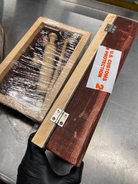 Fentanyl enclosed in wooden items shipped to America
