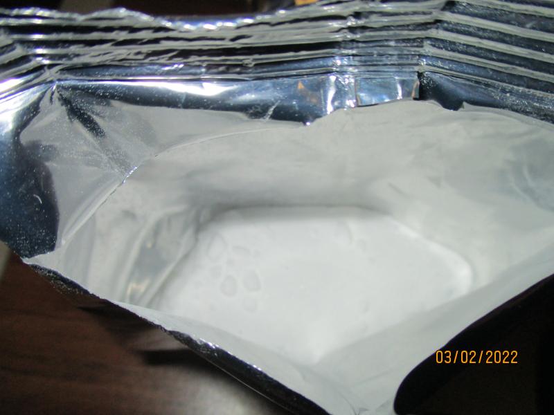 Inside of aluminum bag, is white powder ketamine